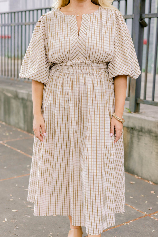Chic Soul plus size clothing, brown maxi dress with a plaid pattern as well as bubble sleeves and a slight v-neckline 