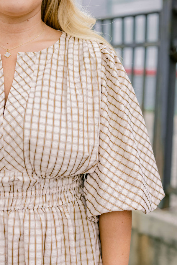 Chic Soul plus size clothing, brown maxi dress with a plaid pattern as well as bubble sleeves and a slight v-neckline 