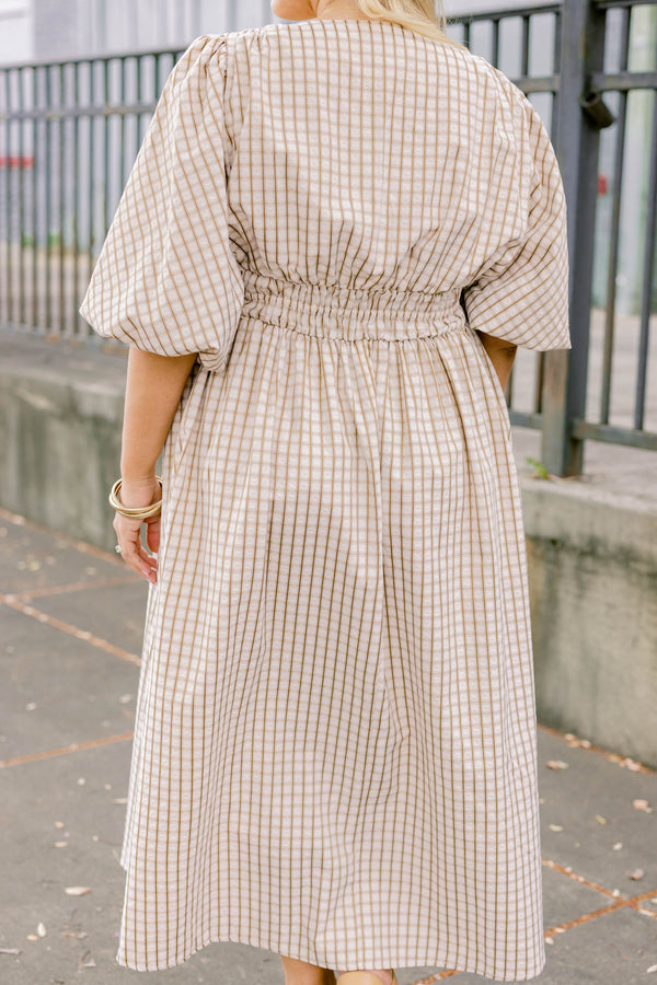 Chic Soul plus size clothing, brown maxi dress with a plaid pattern as well as bubble sleeves and a slight v-neckline 