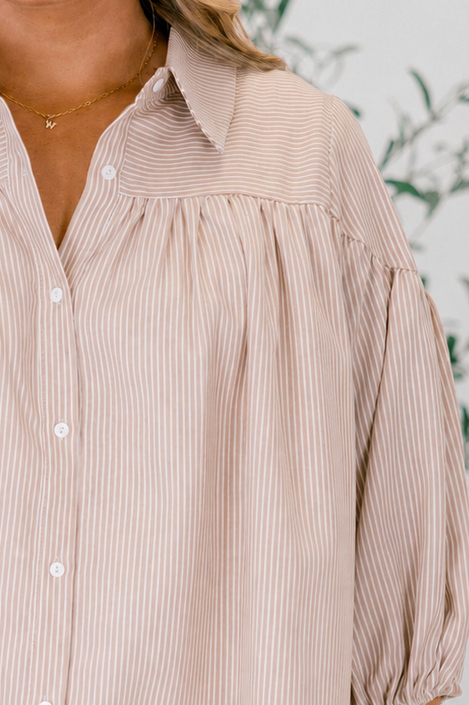 Chic Soul plus size clothing, brown half sleeve top with buttons going down the center of the shirt as well as a striped pattern throughout 