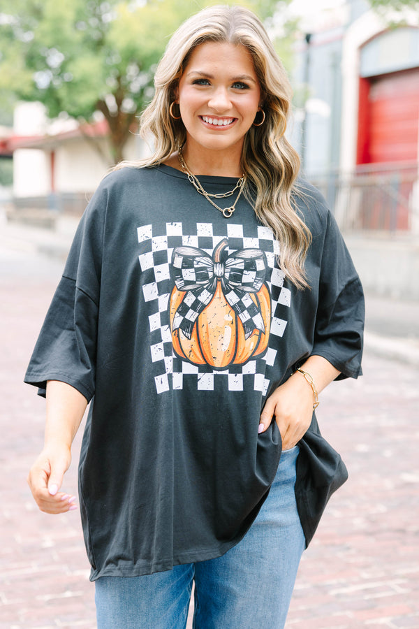 black oversized boyfriend tee with a checkered pumpkin graphic