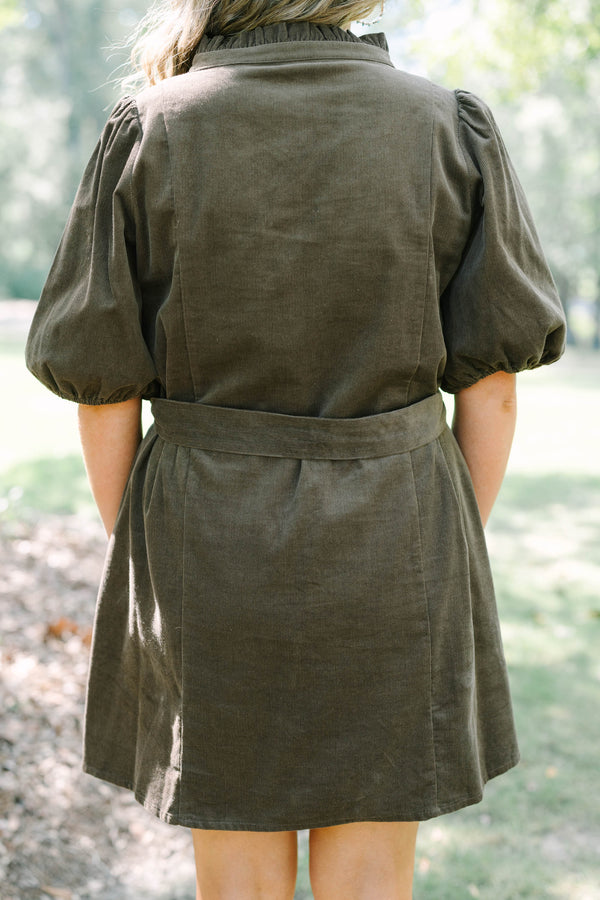 Plus Size brown corduroy mini dress with scalloped button front, puff sleeves, and a tie waist.