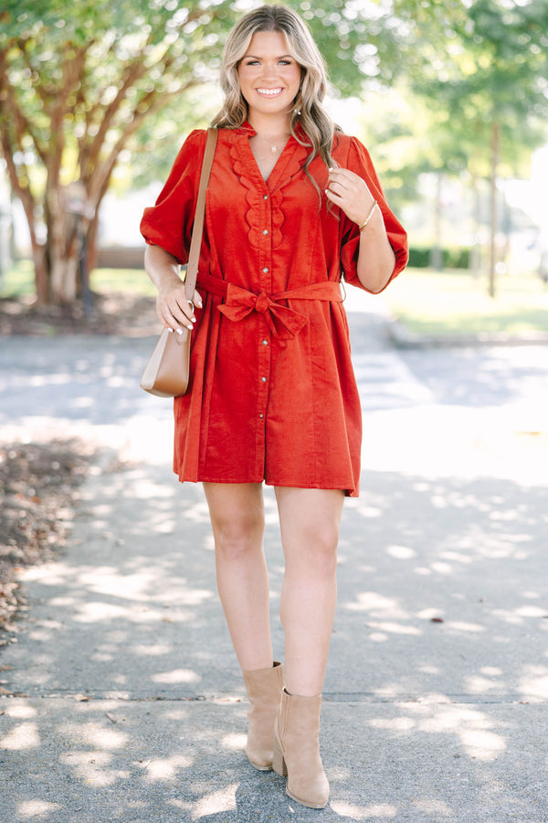 Plus Size rust corduroy mini dress with scalloped trim, button-down front, and a matching waist tie.