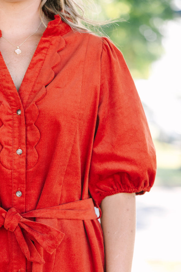 Plus Size rust corduroy mini dress with scalloped trim, button-down front, and a matching waist tie.