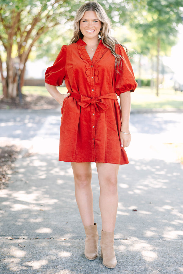 Plus Size rust corduroy mini dress with scalloped trim, button-down front, and a matching waist tie.