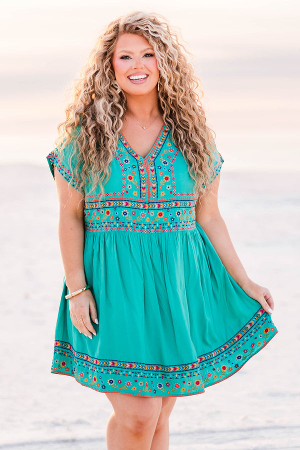 Chic Soul plus size clothing, emerald short sleeve mini dress with v neck and floral embroidery along bottom of the dress, waist, neckline, and sleeves