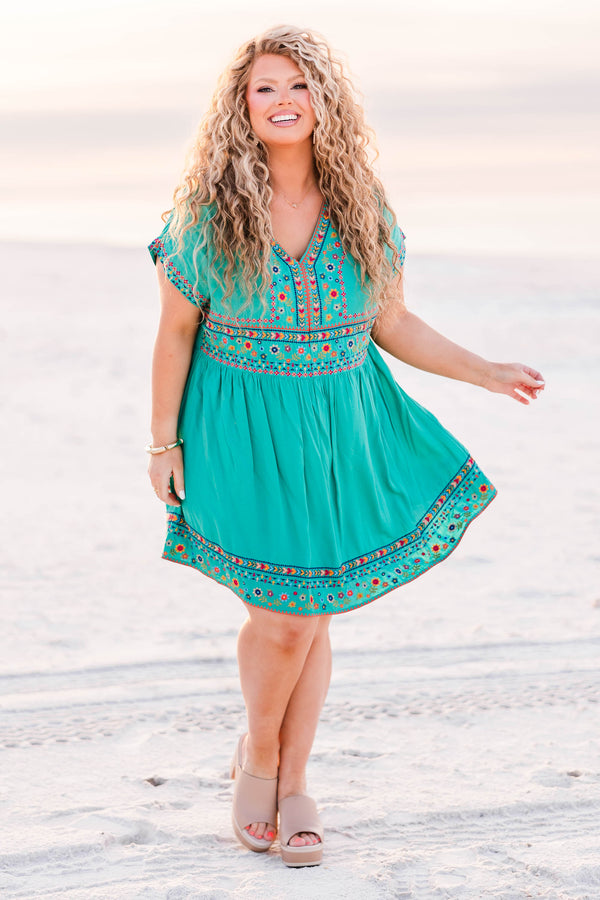 Chic Soul plus size clothing, emerald short sleeve mini dress with v neck and floral embroidery along bottom of the dress, waist, neckline, and sleeves