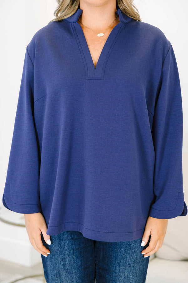 Plus size navy Classic Charm Top with long sleeves, a flowy fit, v-neckline, and stretchy cotton-blend fabric.