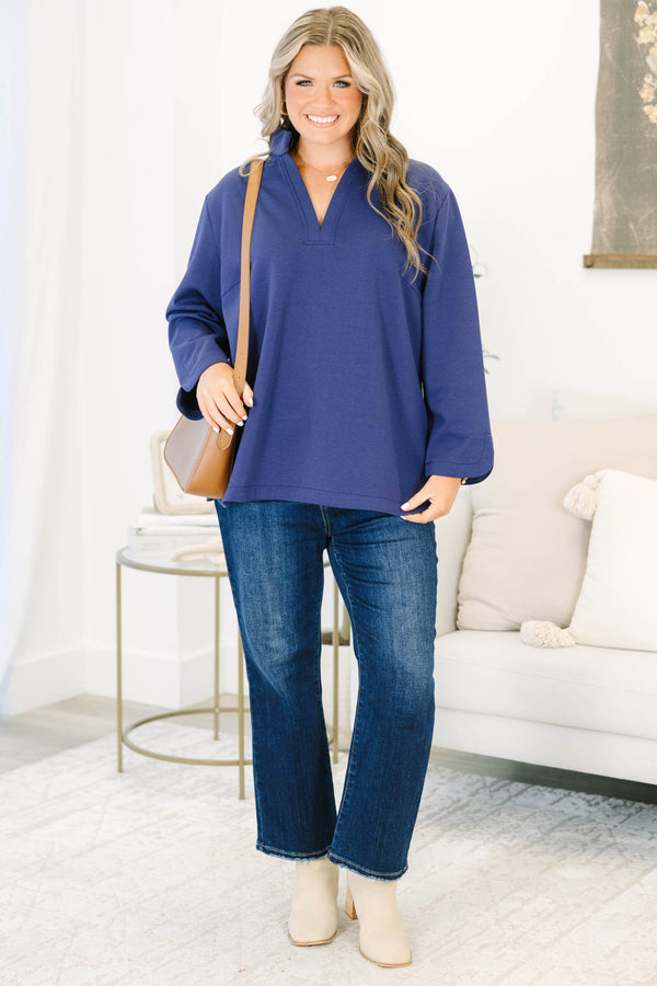 Plus size navy Classic Charm Top with long sleeves, a flowy fit, v-neckline, and stretchy cotton-blend fabric.