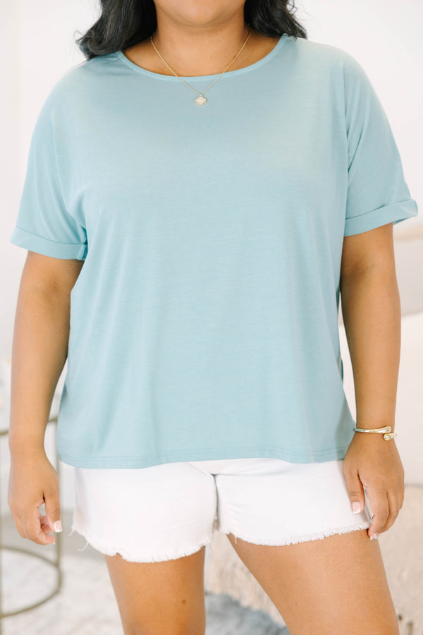 Plus size mint green short-sleeve top with a flowy fit 
