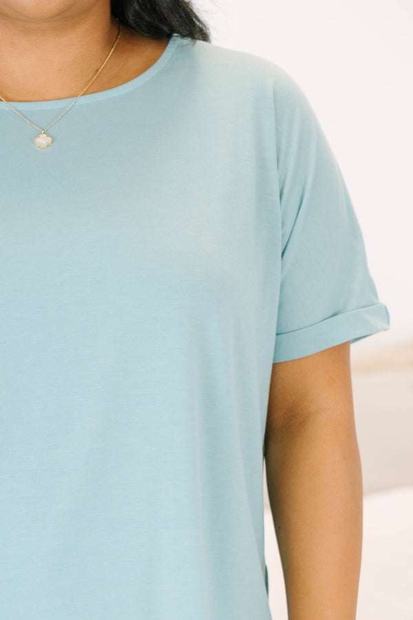 Plus size mint green short-sleeve top with a flowy fit 