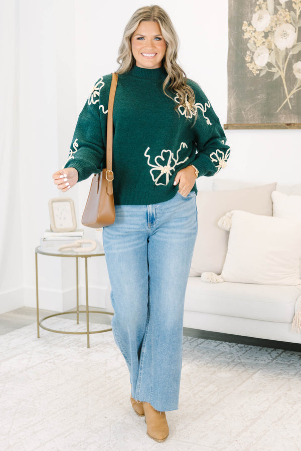 Plus Size medium wash wide-leg jeans with a high-rise fit and raw, frayed hems.