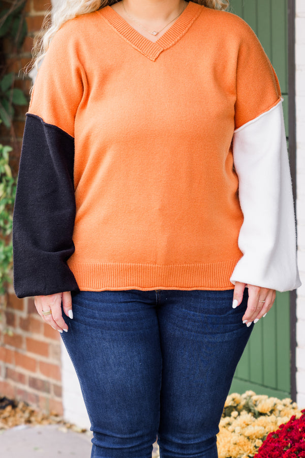 Chic Soul plus size clothing, long-sleeve copper sweater with v-neckline with one ivory sleeve and one black sleeve with distressed detailing