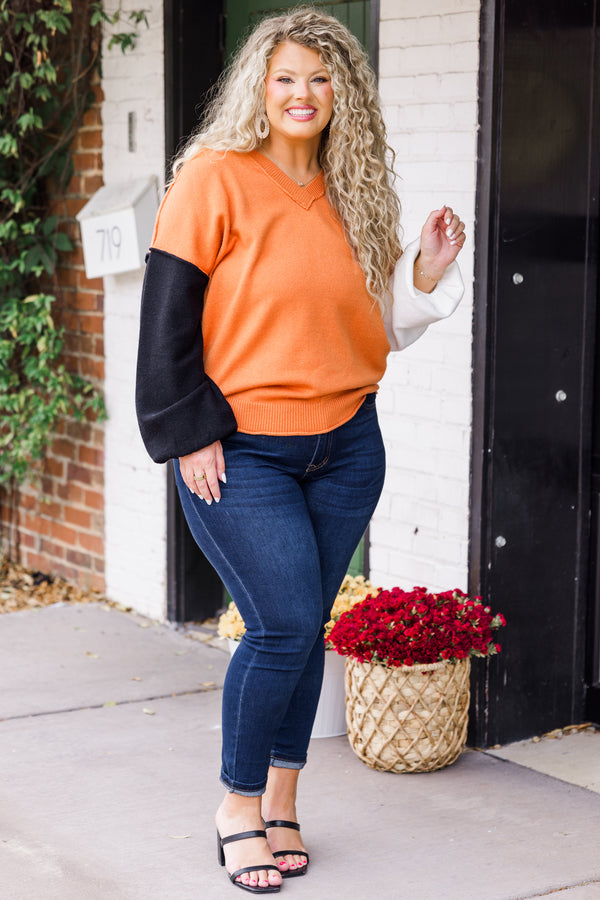 Chic Soul plus size clothing, long-sleeve copper sweater with v-neckline with one ivory sleeve and one black sleeve with distressed detailing