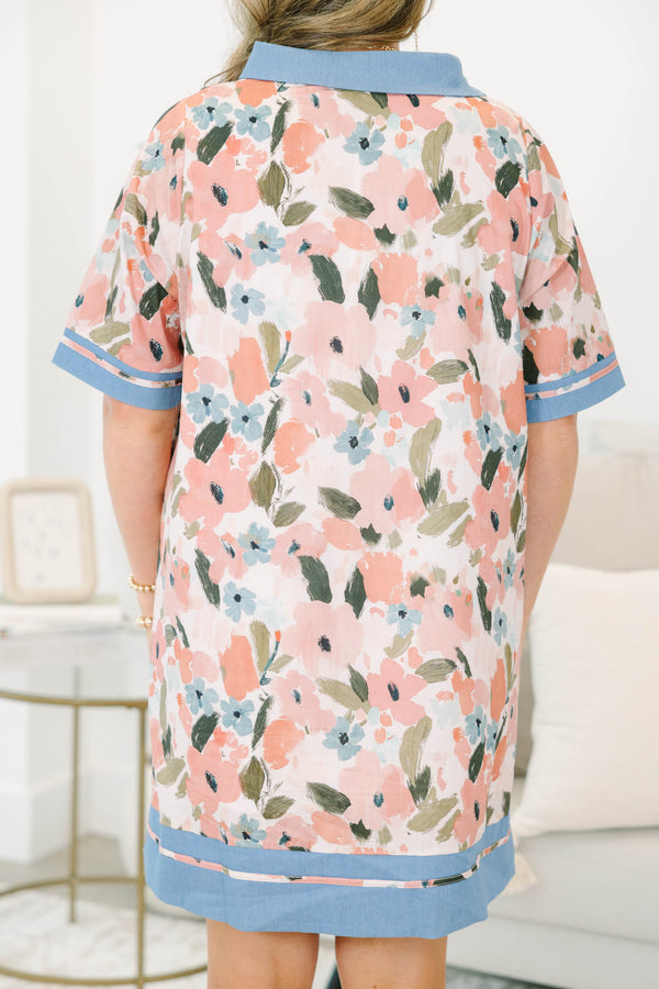 Plus size pink floral cotton dress with blue denim-style collar, button placket, and hem trim.