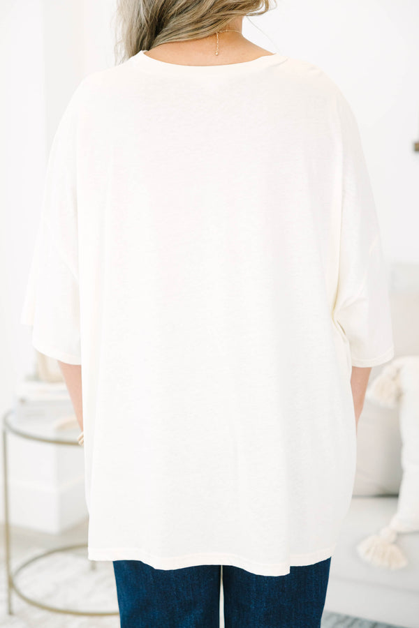 Plus size ivory boyfriend tee with a colorful watercolor jack-o'-lantern graphic.