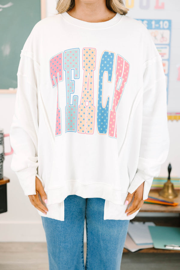 Plus Size ivory crew neck sweatshirt with a colorful polka dot 'TEACH' graphic on the front.