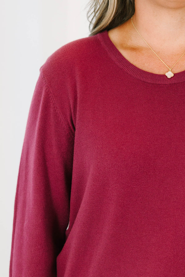Burgundy plus size sweater featuring a relaxed fit and soft, stretchy knit.