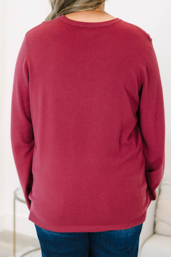 Burgundy plus size sweater featuring a relaxed fit and soft, stretchy knit.