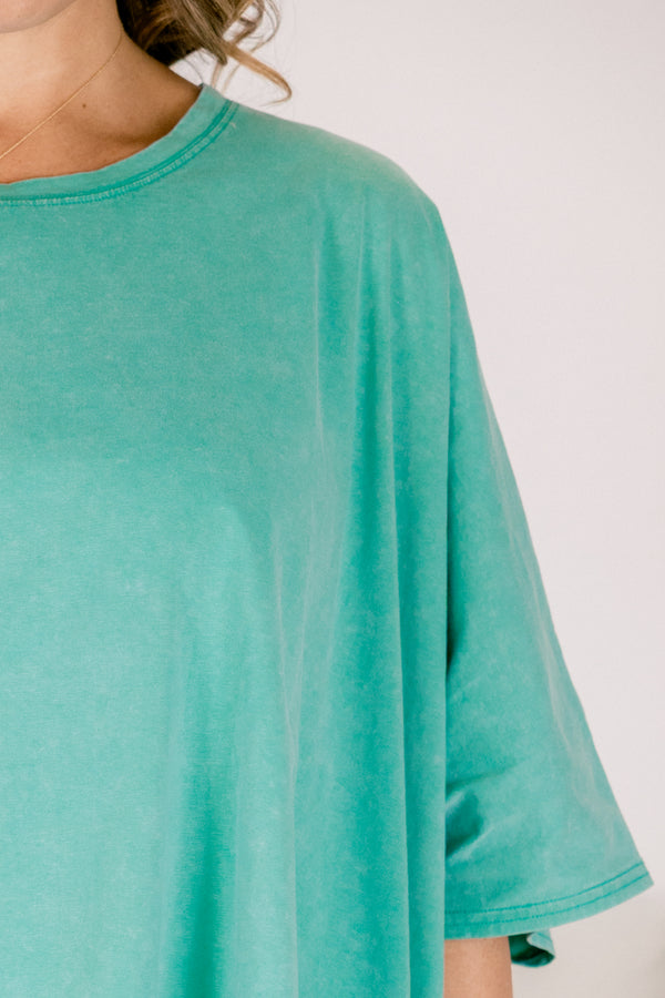 Chic Soul plus size clothing, turquoise flowy tunic with a high neck and short sleeves 
