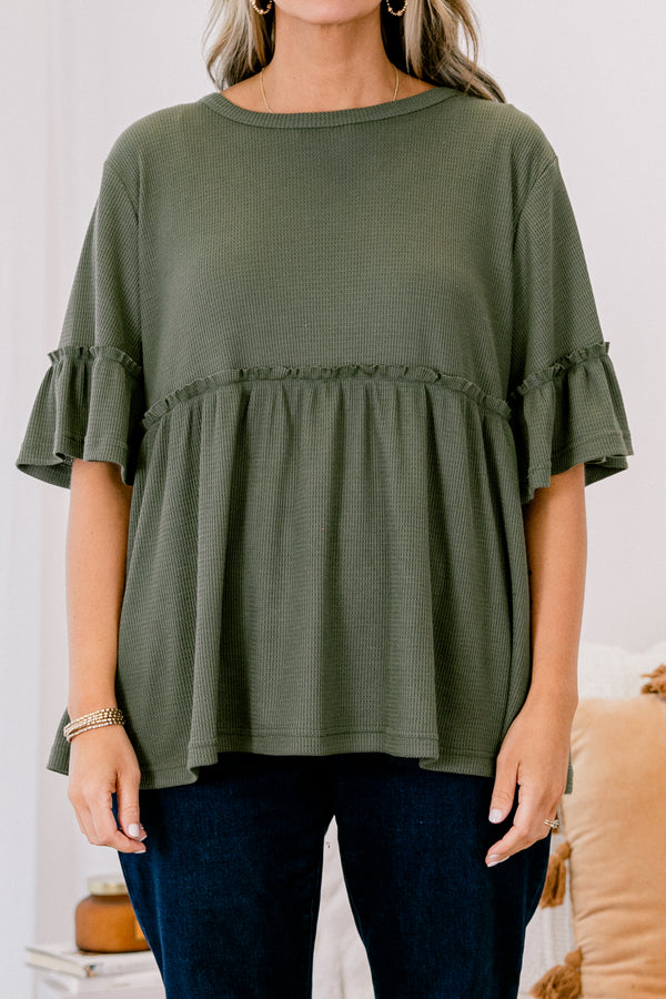 Chic Soul plus size clothing, Olive baby doll top that has short sleeves and small ruffling across the chest and on top of the sleeves 

