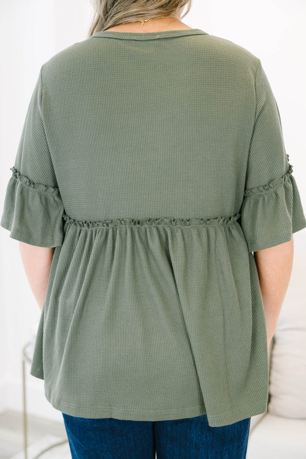 Chic Soul plus size clothing, Olive baby doll top that has short sleeves and small ruffling across the chest and on top of the sleeves 