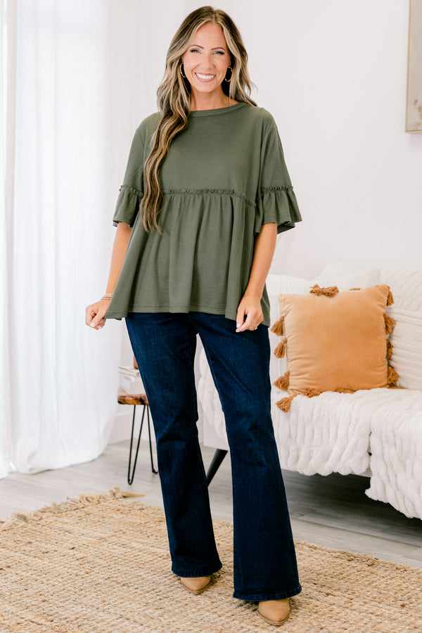 Chic Soul plus size clothing, Olive baby doll top that has short sleeves and small ruffling across the chest and on top of the sleeves 
