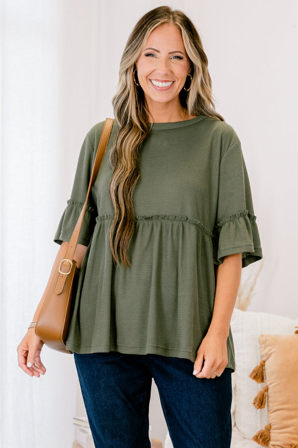 Chic Soul plus size clothing, Olive baby doll top that has short sleeves and small ruffling across the chest and on top of the sleeves 
