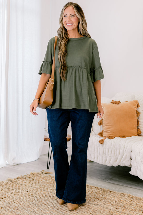 Chic Soul plus size clothing, Olive baby doll top that has short sleeves and small ruffling across the chest and on top of the sleeves 
