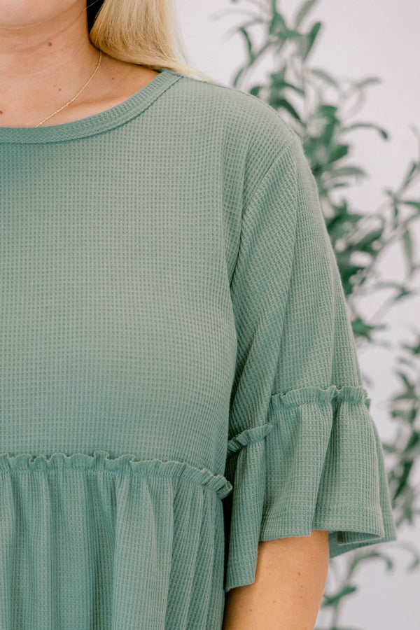 Chic Soul plus size clothing, sage short sleeve tunic with ruffle details under the chest area and half way down the sleeves 