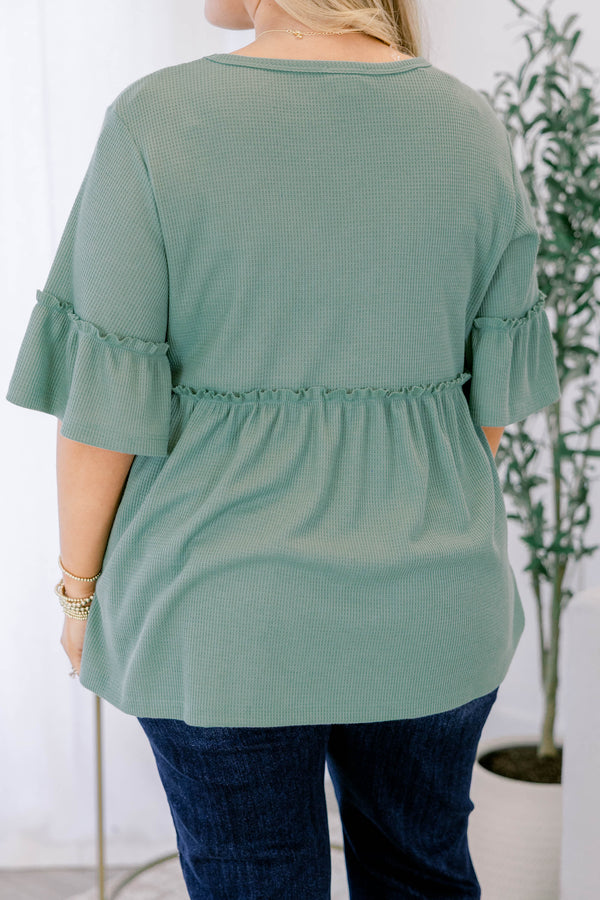 Chic Soul plus size clothing, sage short sleeve tunic with ruffle details under the chest area and half way down the sleeves 