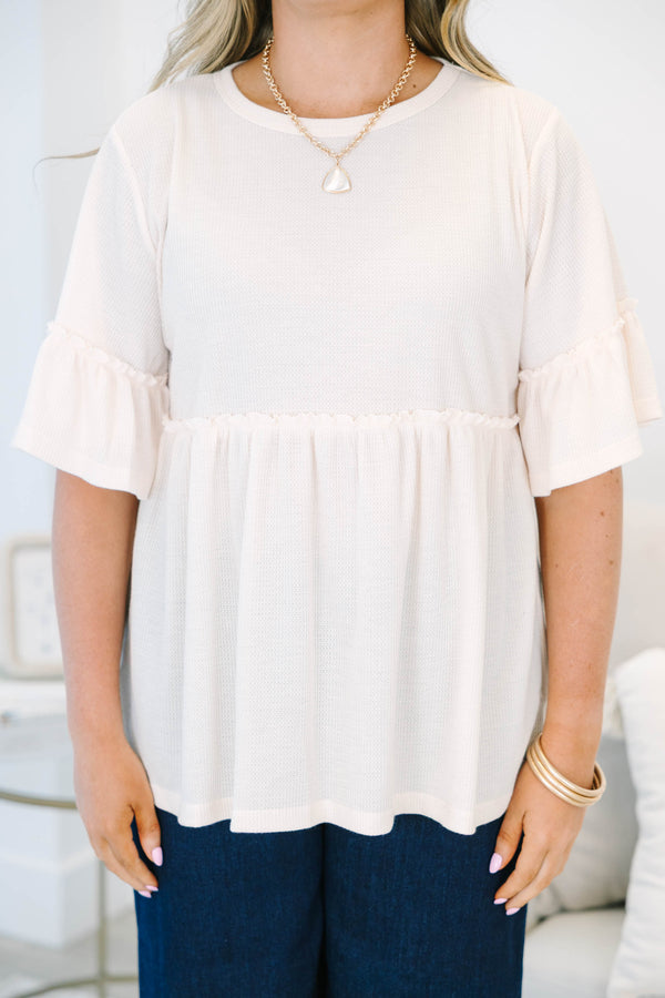 Plus Size taupe waffle knit babydoll tunic with ruffled bell sleeves.