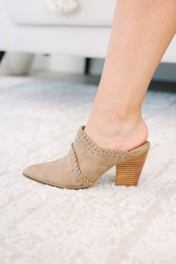 Corky's Blame It Mules in tan suede with a pointed toe, block heel, and studded whipstitch detail.