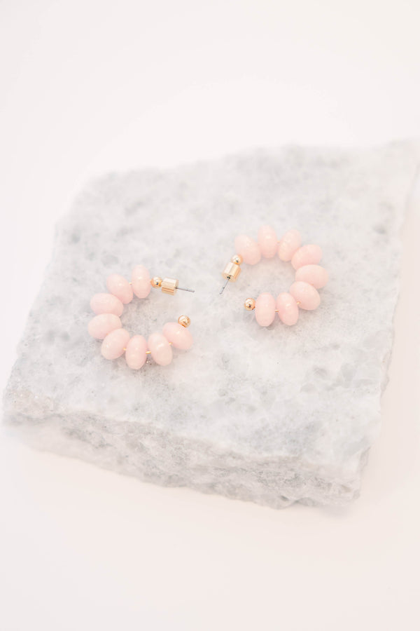 Plus Size pink resin bead hoop earrings with gold-tone hardware.