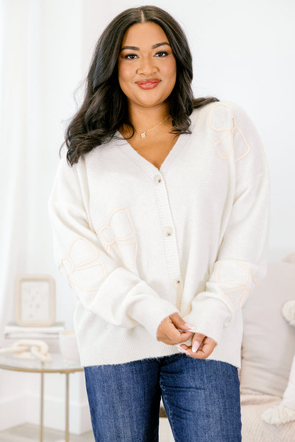 Chic Soul plus size clothing, cream button up cardigan with bow shape embroidered in several spots