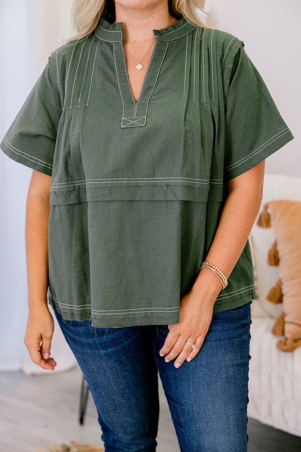 Chic Soul plus size clothing, forest green short sleeve v-nect top with small collar and cream color stitch detailing on the seams on the neckline, sleeves, and hem