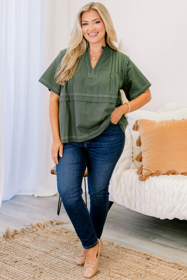 Chic Soul plus size clothing, forest green short sleeve v-nect top with small collar and cream color stitch detailing on the seams on the neckline, sleeves, and hem