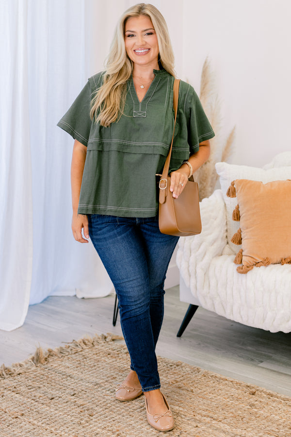 Chic Soul plus size clothing, forest green short sleeve v-nect top with small collar and cream color stitch detailing on the seams on the neckline, sleeves, and hem