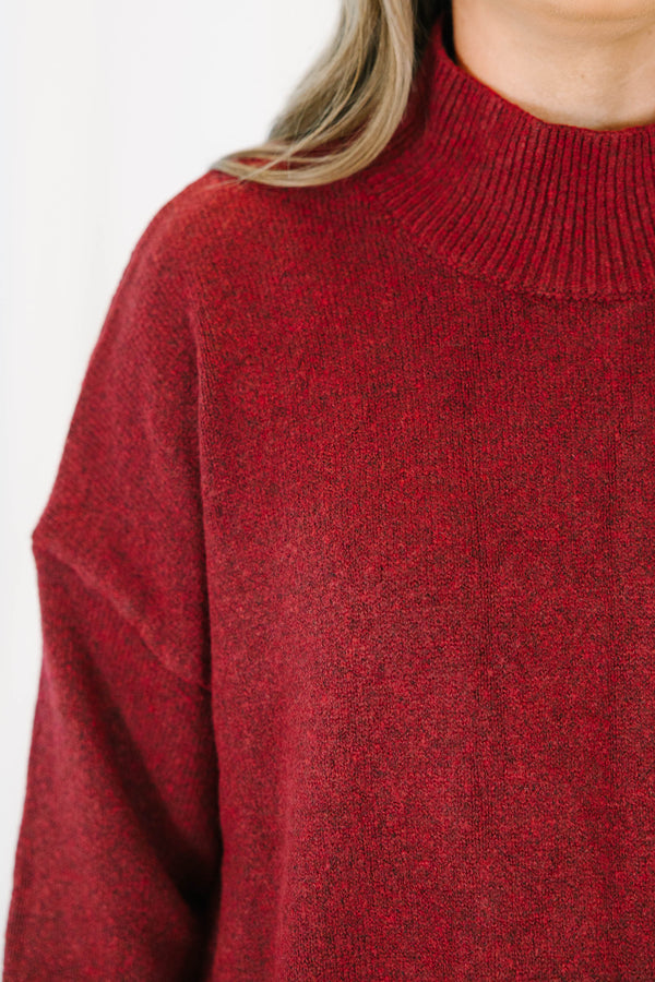 Plus Size wine red mock neck sweater with a relaxed fit, drop shoulders, and ribbed knit trim.