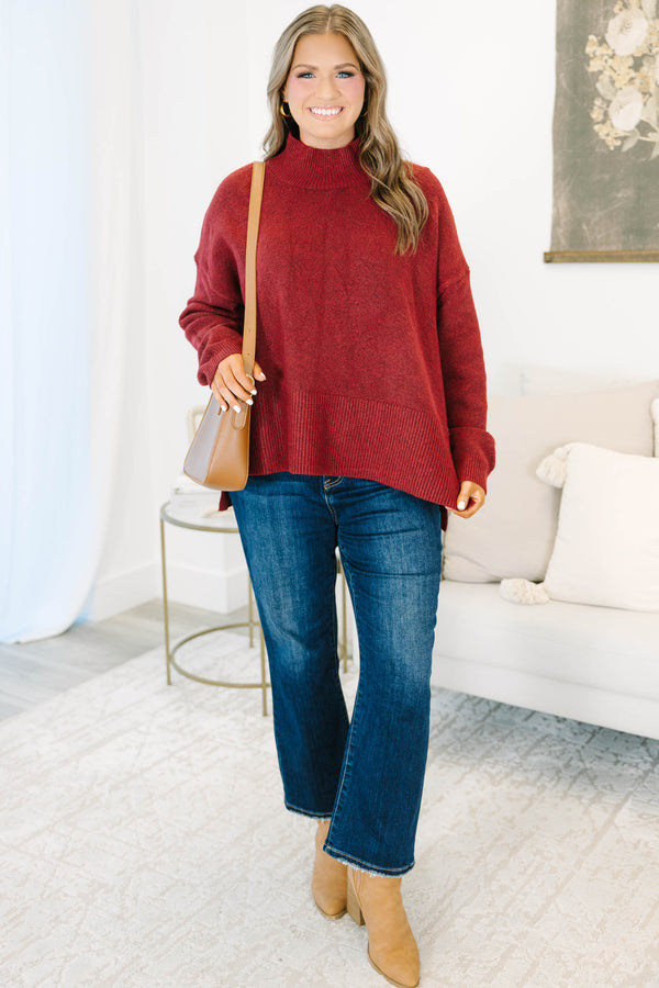 Plus Size wine red mock neck sweater with a relaxed fit, drop shoulders, and ribbed knit trim.