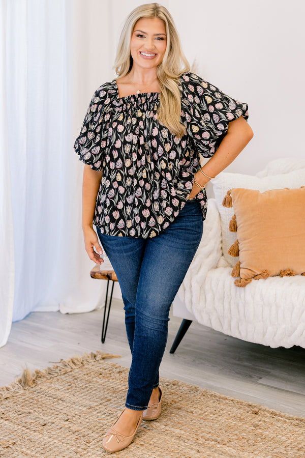 Chic Soul plus size clothing, black baby doll short sleeve top with bubble sleeves and pale pink and yellow floral print