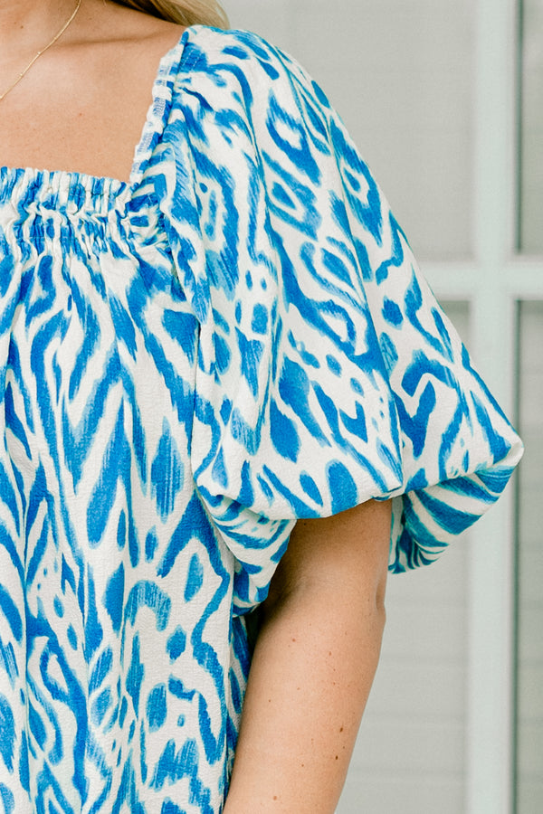 Chic Soul plus size clothing, Blue and white top with an abstract pattern and bubble sleeves 
