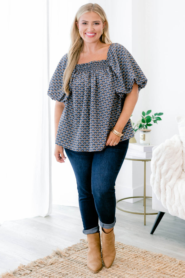Chic Soul plus size clothing, navy and orange patterned baby doll top with short, bubble sleeves
