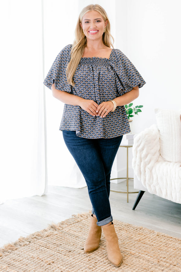 Chic Soul plus size clothing, navy and orange patterned baby doll top with short, bubble sleeves