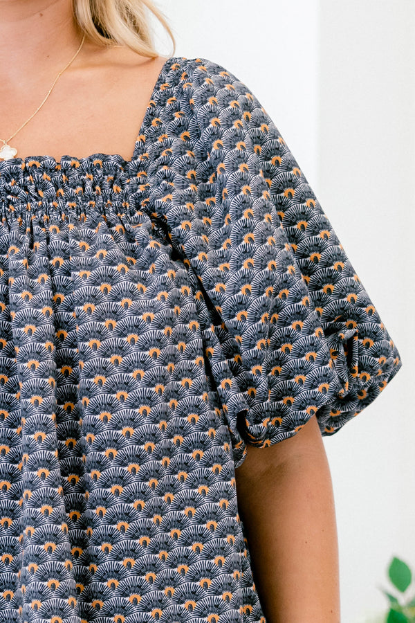 Chic Soul plus size clothing, navy and orange patterned baby doll top with short, bubble sleeves