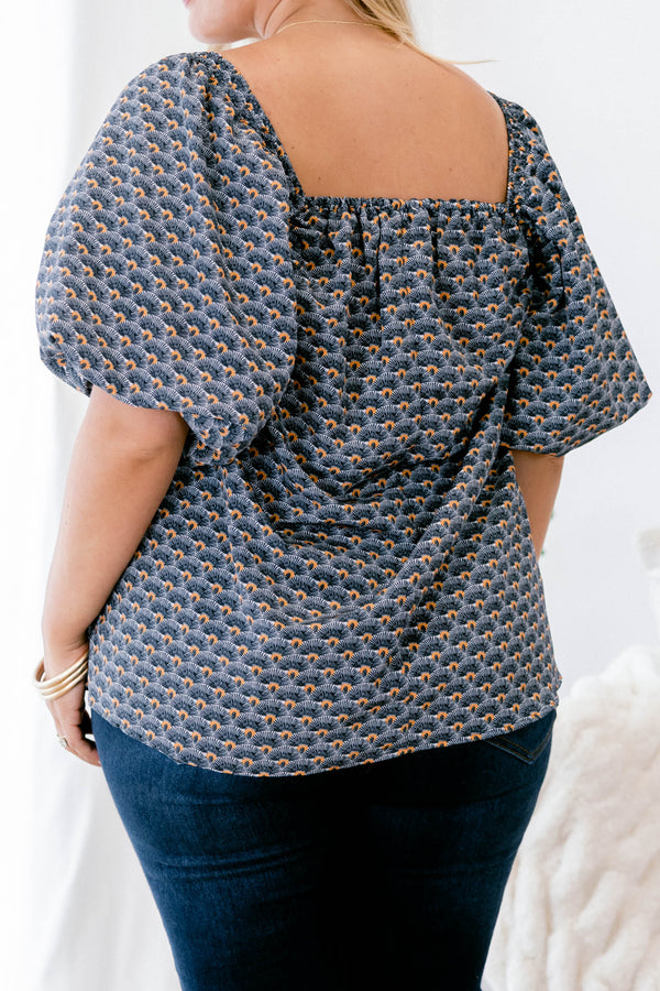 Chic Soul plus size clothing, navy and orange patterned baby doll top with short, bubble sleeves