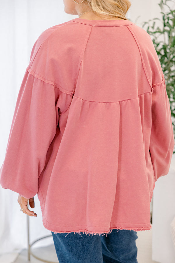 Chic Soul plus size clothing, mauve pink long sleeve top with buttons going down to the chest as well as distressed details at the bottom of the top