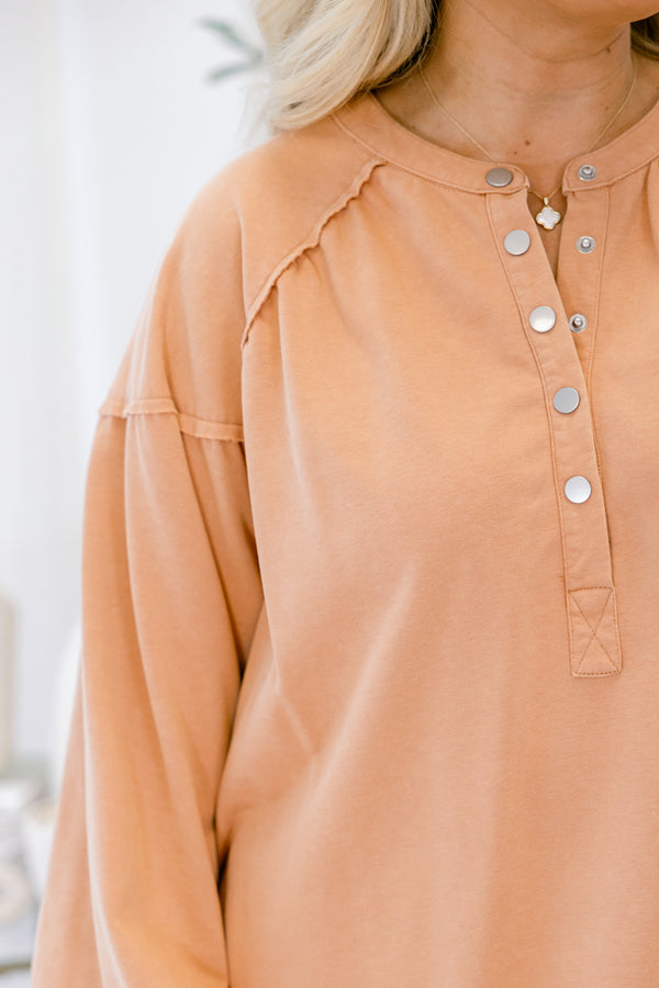 Chic Soul plus size clothing, light peach long sleeve button up pullover with distressed hem and silver buttons 1/4 way down