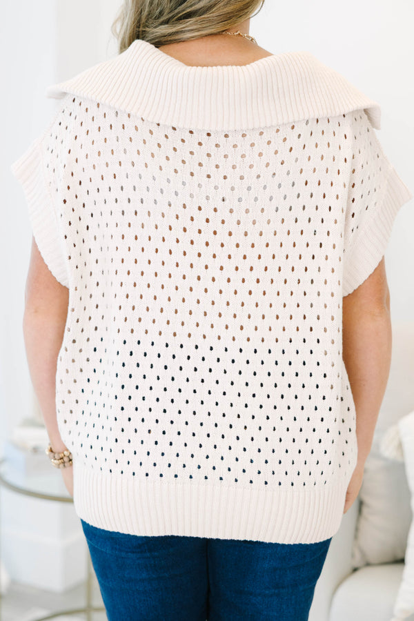 Plus Size taupe knit sweater with a quarter-zip collar, short sleeves, and open-stitch pattern.