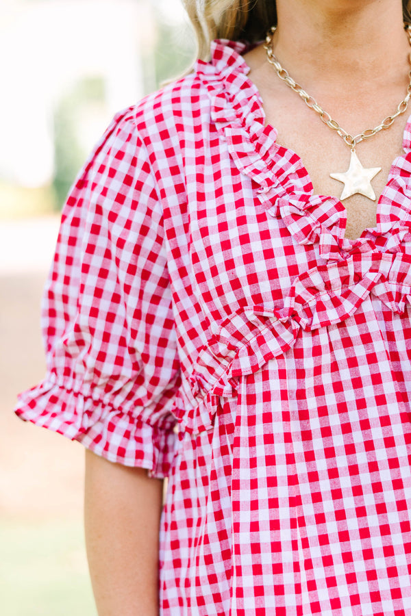 Plus size flowy short-sleeve button-down top with a relaxed fit.